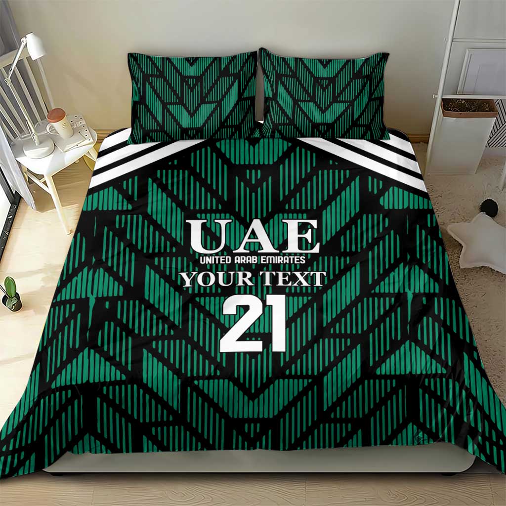 Green UAE football bedding set on bed with UAE 21 crest, geometric stripes, and two pillows