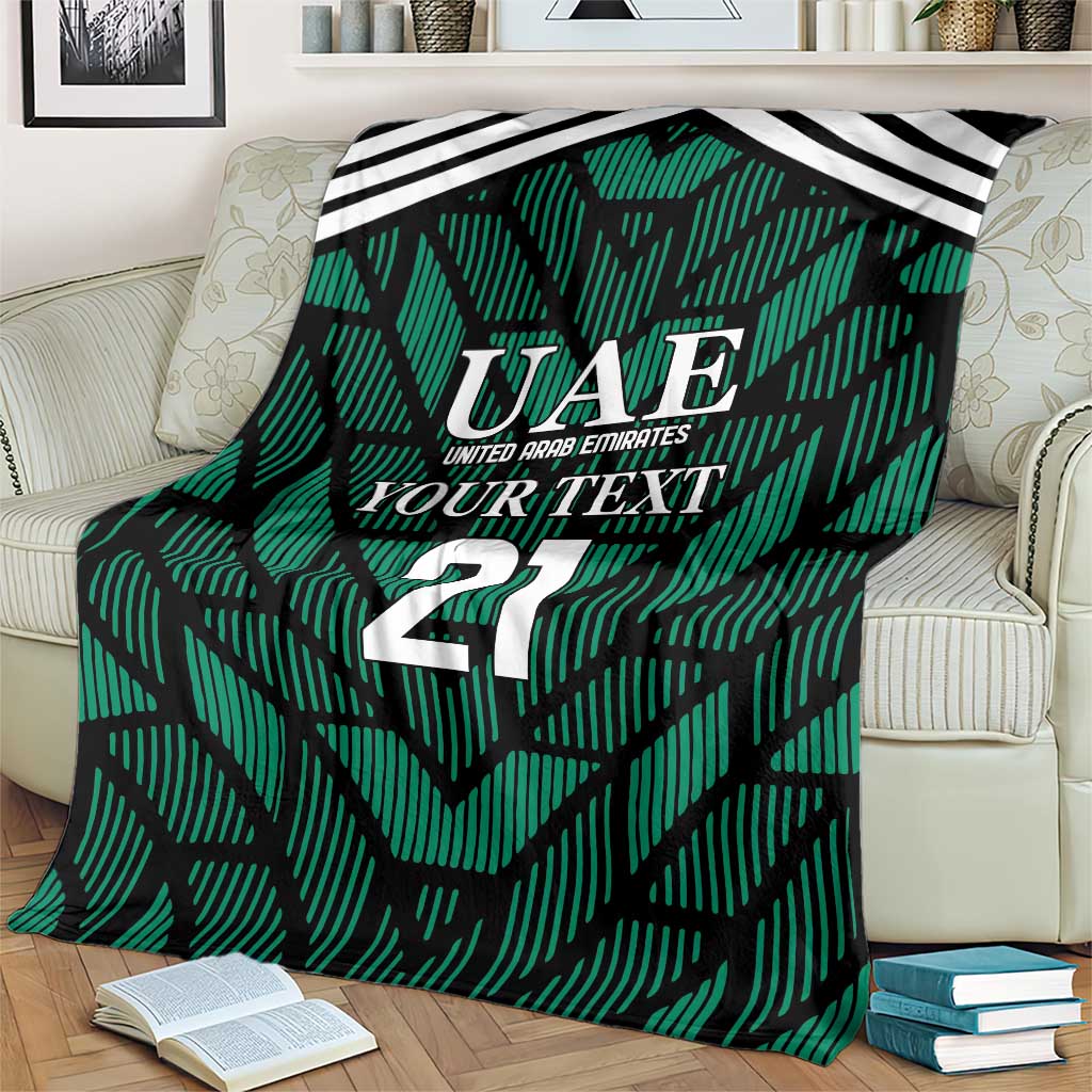 Green football-themed blanket close-up with UAE crest, 'YOUR TEXT', and number 21