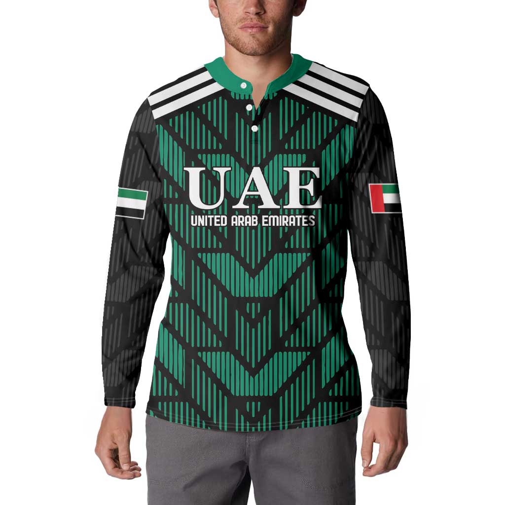 Green and black football button sweatshirt on model, with UAE graphic and striped sleeves