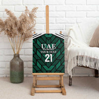 Green UAE football canvas wall art with bold "UAE" logo, "YOUR TEXT", and number "2"