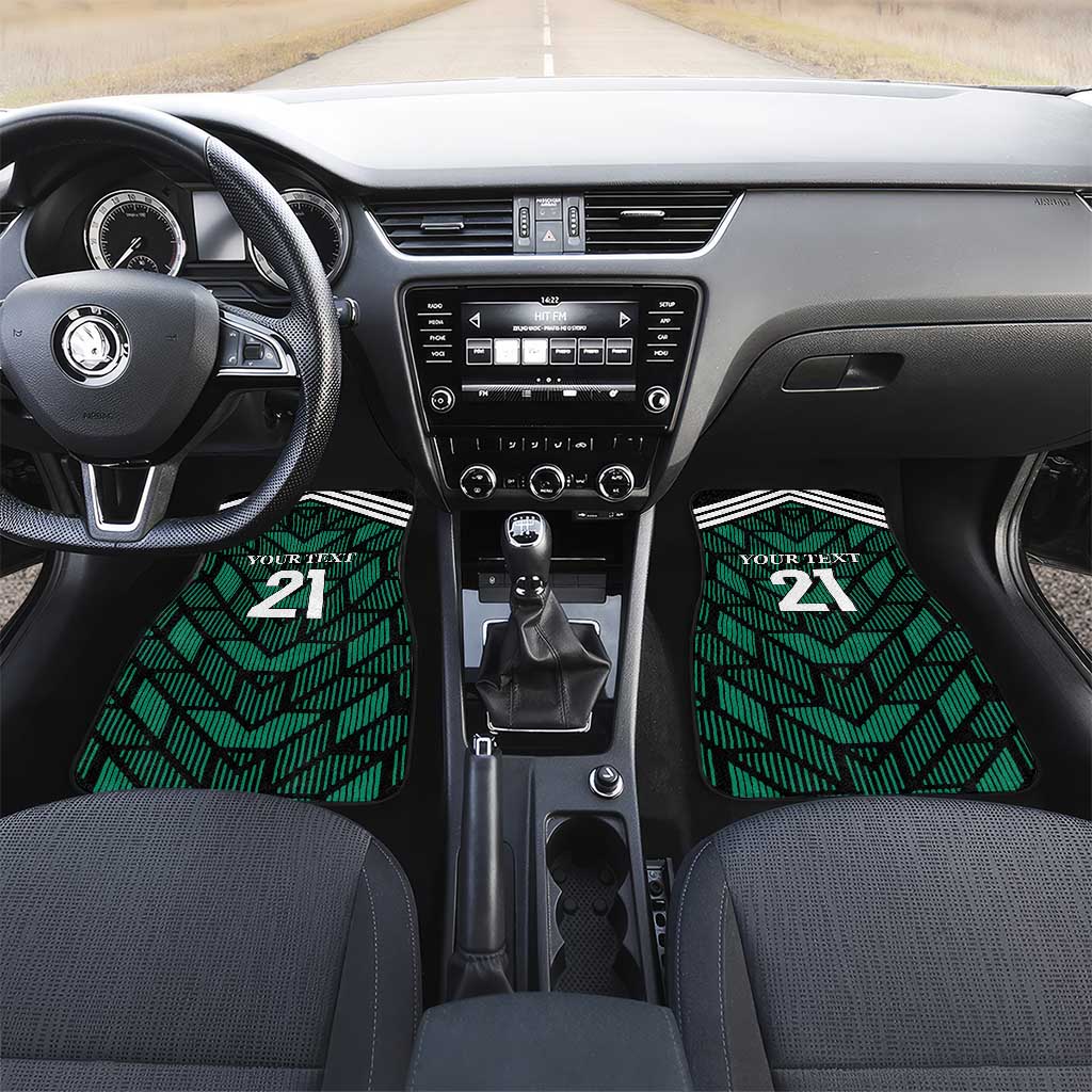 Custom green patterned car floor mats with “21” graphic, shown in front cabin view