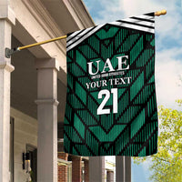 Green UAE garden flag with black-and-white stripe top, crest and number 21