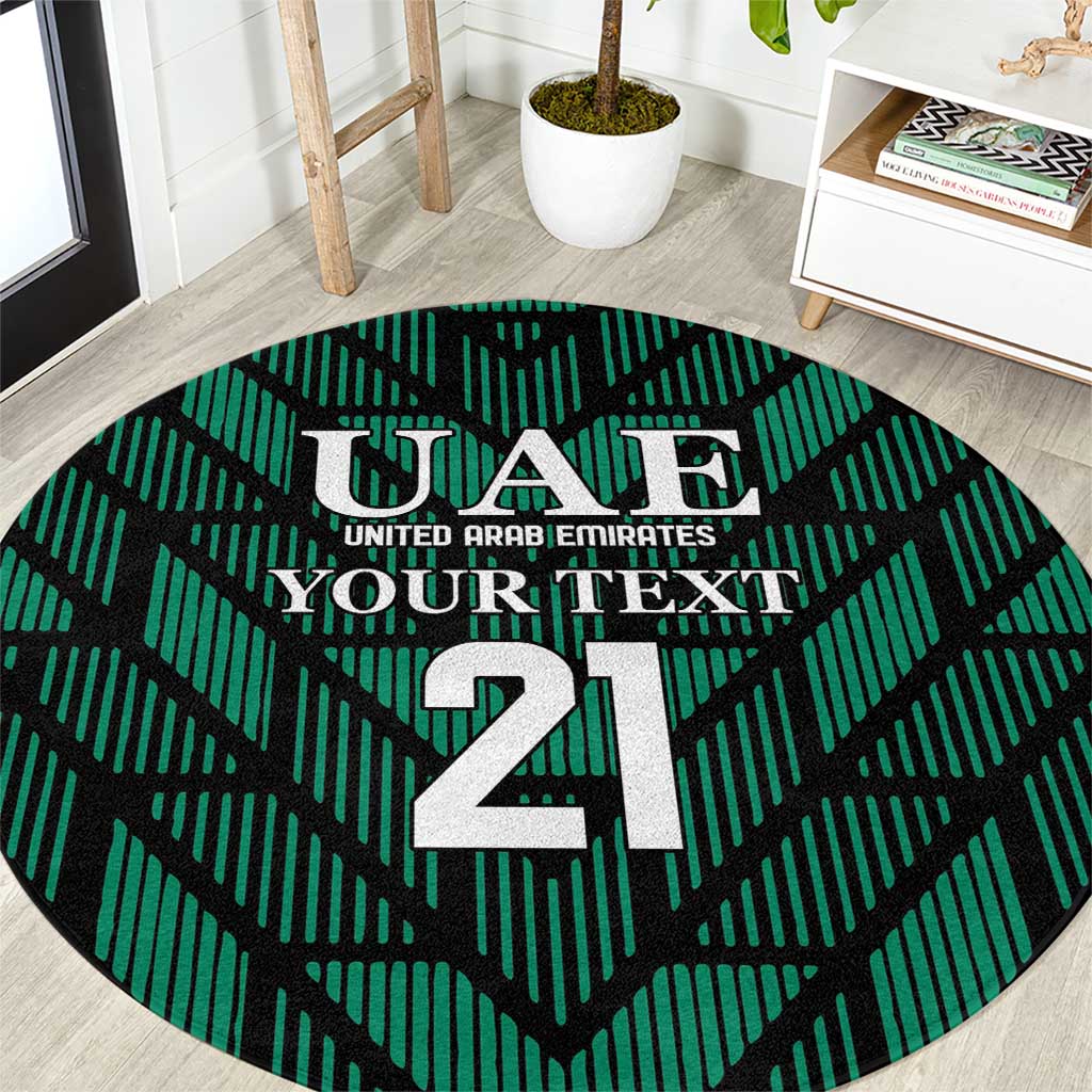 Round green football carpet with UAE crest and large 21 center design