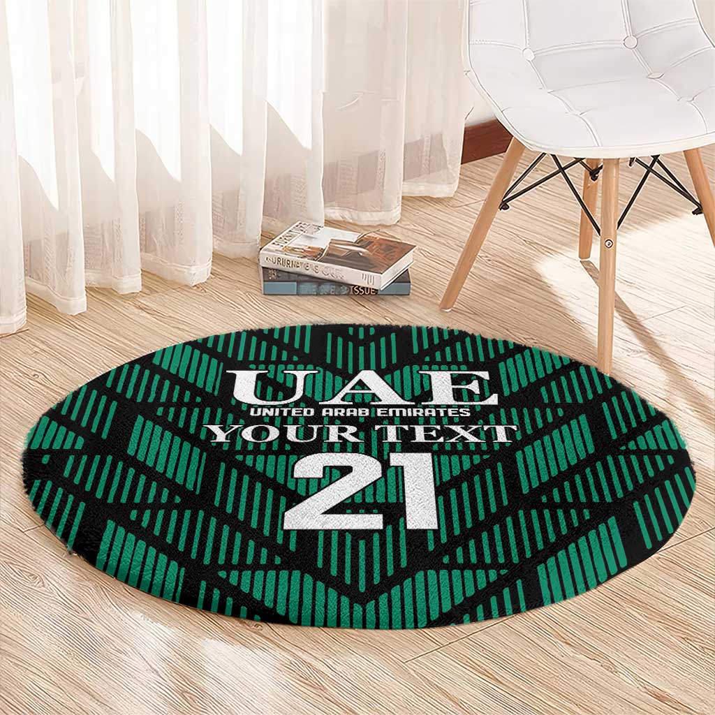 Round green football carpet with UAE crest and large 21, shown on light wood floor