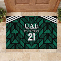 Green UAE football rubber doormat with black/white stripe border and number 21