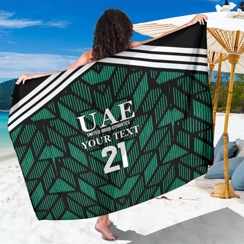 Green football sarong with black-and-white stripe border, UAE text and 'YOUR TEXT 21'