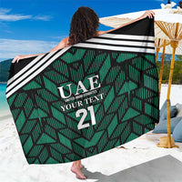 Green football sarong with black-and-white stripe border, UAE text and 'YOUR TEXT 21'
