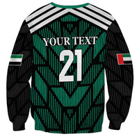 Green-and-black football sweatshirt with back print 'YOUR TEXT' and number 21, striped shoulders