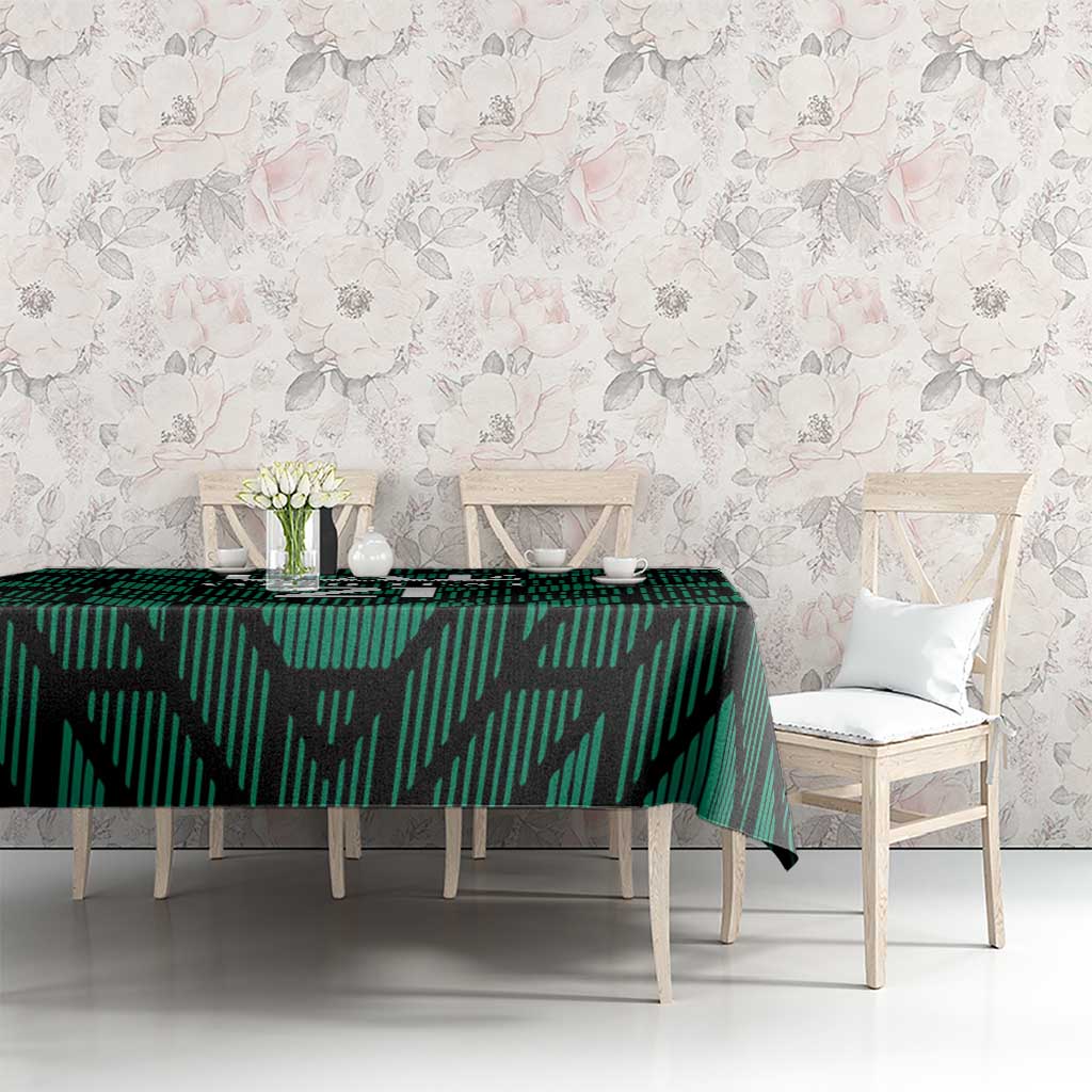 Green UAE football tablecloth with '21' pattern on dining table
