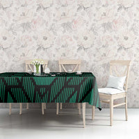 Green UAE football tablecloth with '21' pattern on dining table