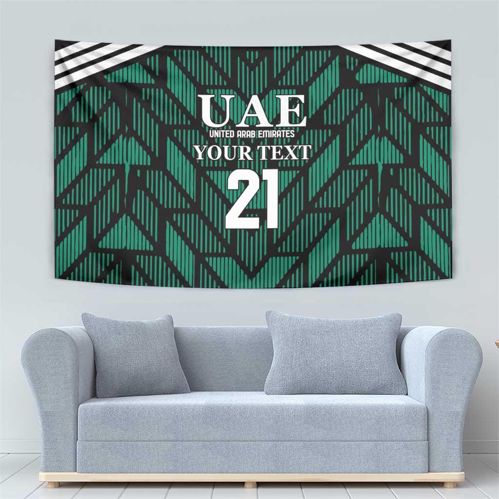 Green football tapestry with UAE crest, 'YOUR TEXT', number 21, and black/white top stripes.