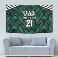 Green football tapestry with UAE crest, 'YOUR TEXT', number 21, and black/white top stripes.