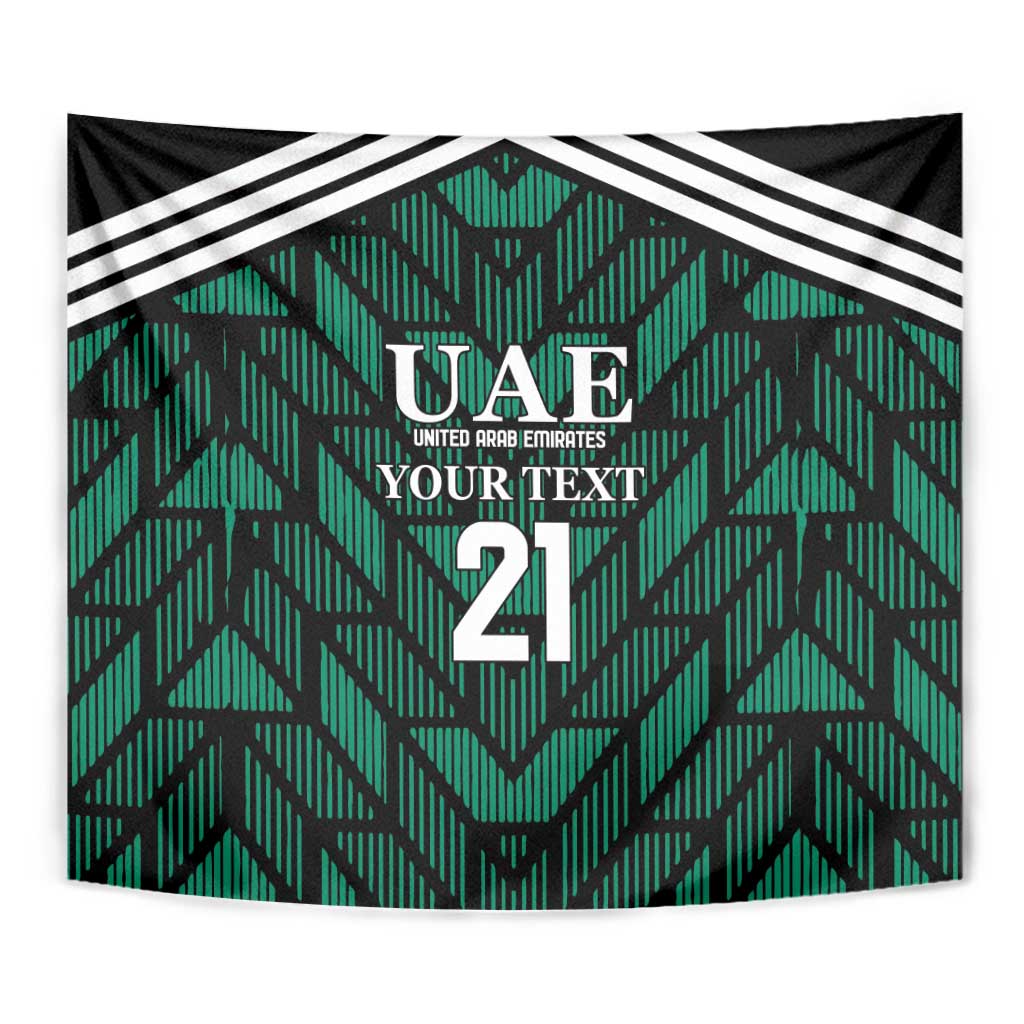 Close-up view of green football tapestry with UAE crest, 'YOUR TEXT', and number 21.