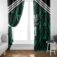 Green window curtain panels with UAE text and black-and-white stripe accents, number 17.