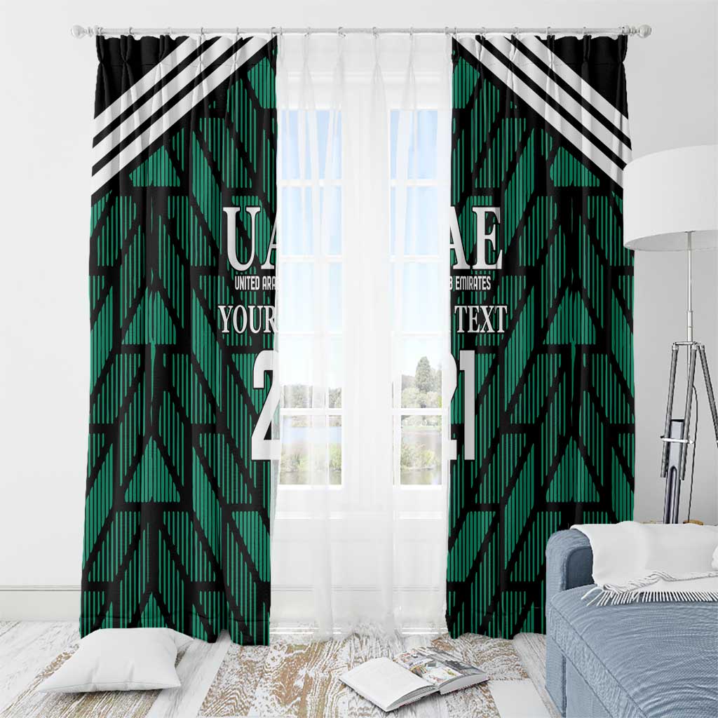 Green window curtain panels with UAE text and bold number print, black-and-white stripes.