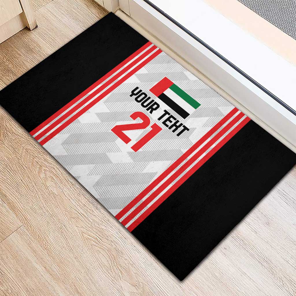 Custom rubber doormat with black border and central “YOUR TEXT 21” graphic and UAE flag