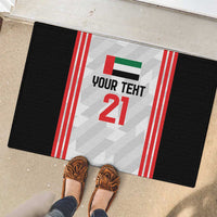 Custom rubber doormat featuring black sides and centered “YOUR TEXT 21” with flag stripes