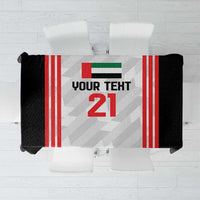 Football tablecloth in black, white, and red with vertical stripes and custom number panel