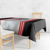 Black and white football tablecloth with red vertical stripes and folded side drape