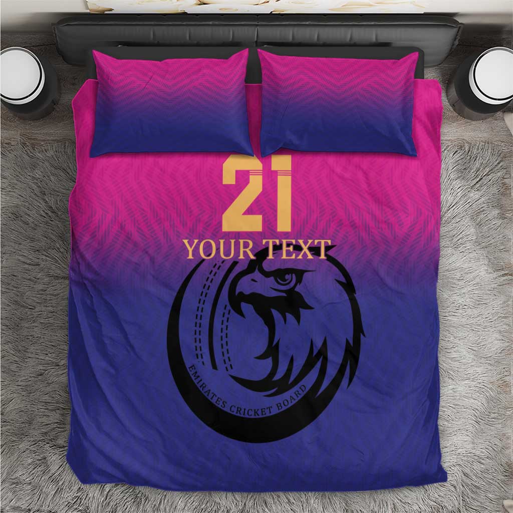 Pink and blue cricket bedding set with number 21 graphic and falcon emblem