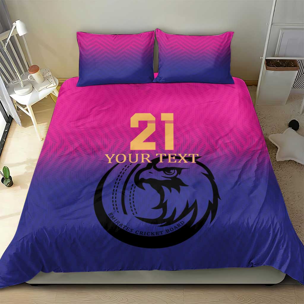 Pink and blue cricket bedding set with number 21, falcon emblem, and chevron pattern