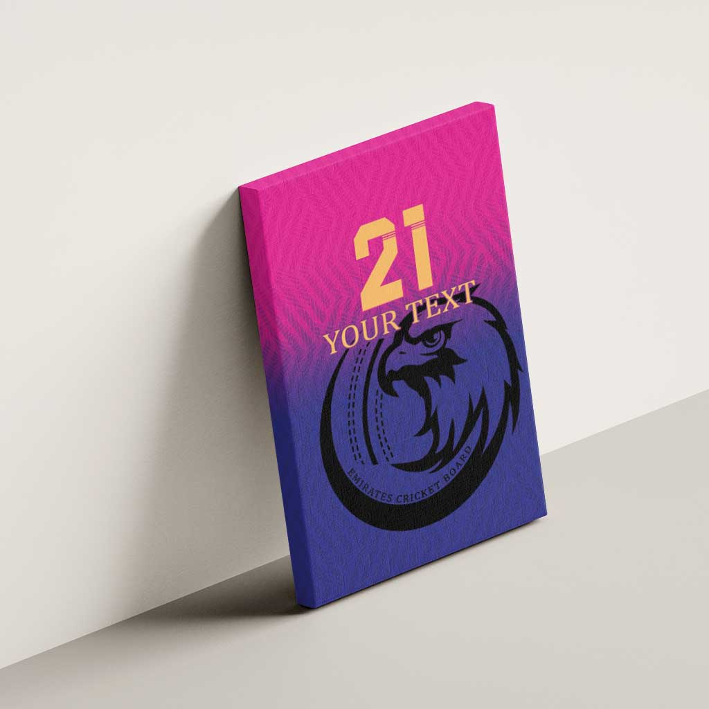 Pink and blue cricket canvas wall art mounted on wall with gold '21' and falcon logo
