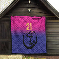 Custom cricket quilt hanging indoors, pink-to-blue quilted pattern with number 21 and falcon logo