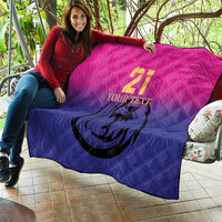 Custom cricket quilt draped outdoors, pink-to-blue gradient with number 21 and falcon emblem