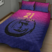 Pink and blue cricket quilt bed set with falcon emblem and gold number on quilt