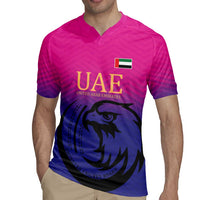 Pink cricket rugby jersey with UAE front text, falcon crest, and flag patch