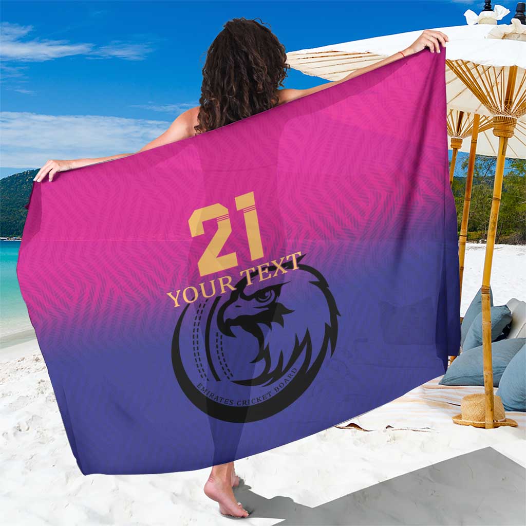 Pink and navy sarong with falcon emblem and custom text graphic