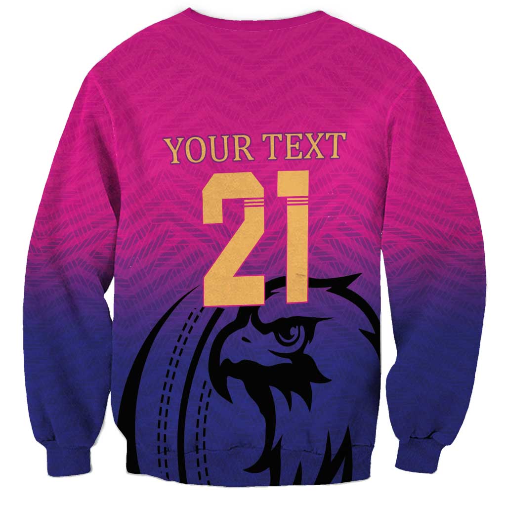 Pink cricket sweatshirt back with 'YOUR TEXT 21' and falcon graphic.
