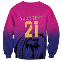 Pink cricket sweatshirt back with 'YOUR TEXT 21' and falcon graphic.