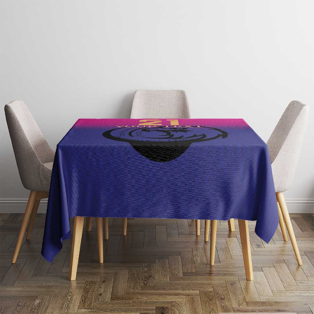 Square cricket tablecloth in purple and pink with dragon emblem centered on table