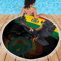 Round beach blanket featuring condor and Bolivia flag motif on black with white fringe