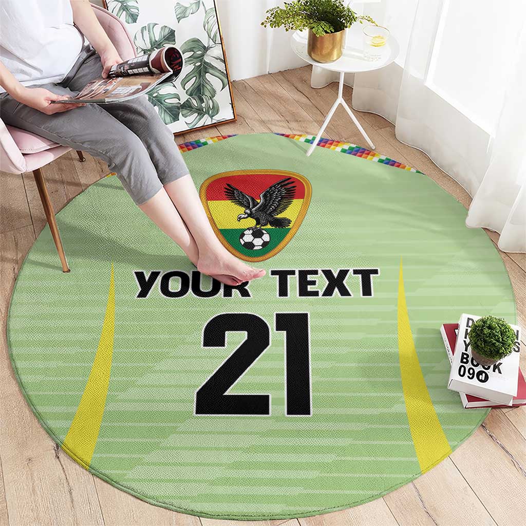 Green circular rug on floor with eagle soccer emblem and 'YOUR TEXT 21' center print
