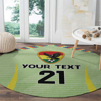 Green round carpet with eagle soccer crest and bold 'YOUR TEXT 21' across center