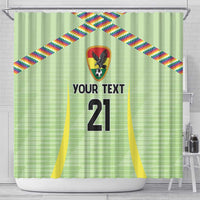 Green soccer shower curtain with top grommets, colorful banner, crest, and '21' center