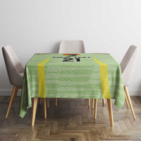 Green tablecloth with bold black number 21, yellow side accents, and custom text