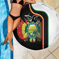 Round beach blanket with country crest graphic, white fringe border and green flag stripe panel
