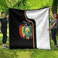 Reversible-style quilt with black left, white right, and Bolivia coat of arms crest.