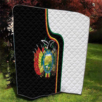 Black-and-white quilt with stitched diamond pattern and Bolivia coat of arms emblem.