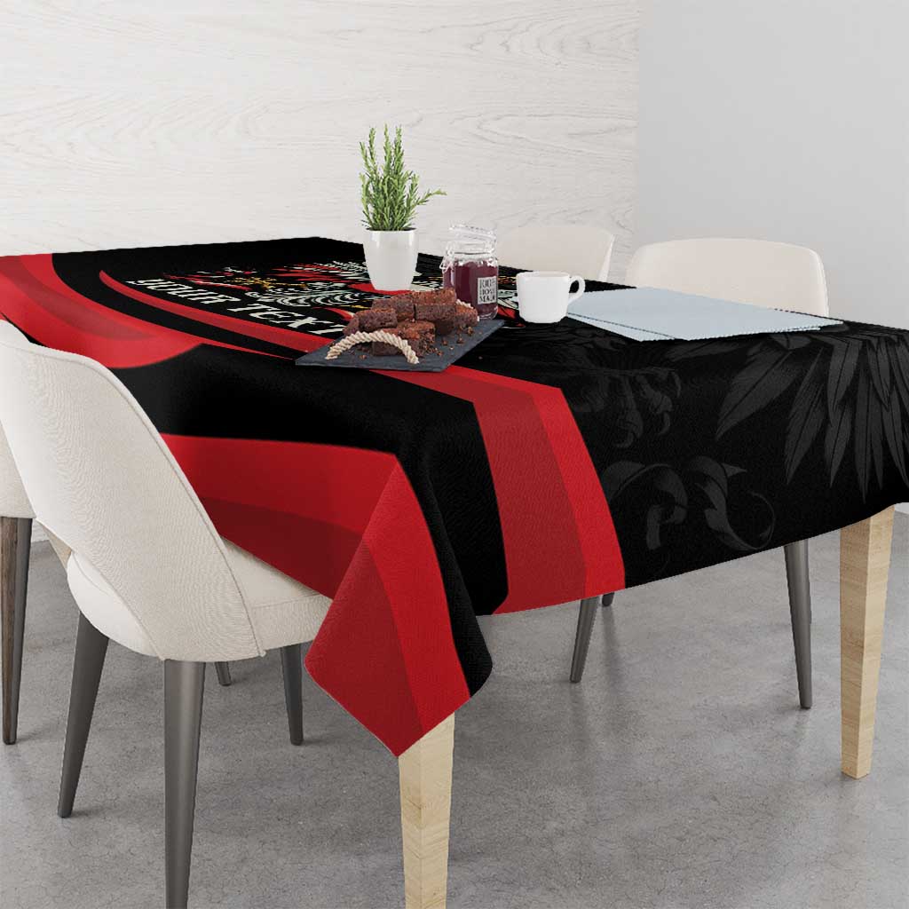 Black tablecloth with red flag-style bands and eagle print across tabletop