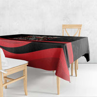 Black and red tablecloth with diagonal stripe pattern and eagle border detail