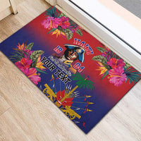 Tropical rubber doormat with floral border, portrait, and fan pattern graphic