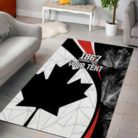 Canada Day area rug, black maple leaf graphic with red trim and Our Teht text