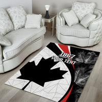 Canada Day area rug on hardwood, black maple leaf design with red border
