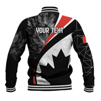 Black baseball jacket with white geometric panels, red diagonal stripe, and maple leaf graphic