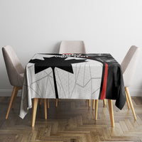 Black personalized Canada Day tablecloth with geometric maple leaf and red stripe