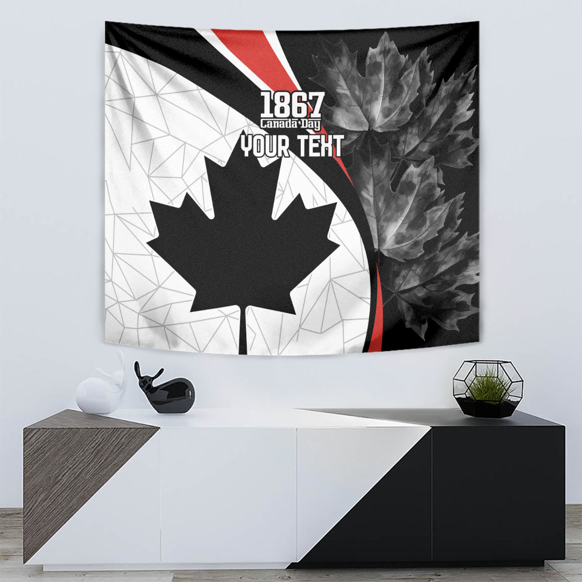 Black, white, and red maple leaf wall tapestry with “1867” and “YOUR TEXT” on top.